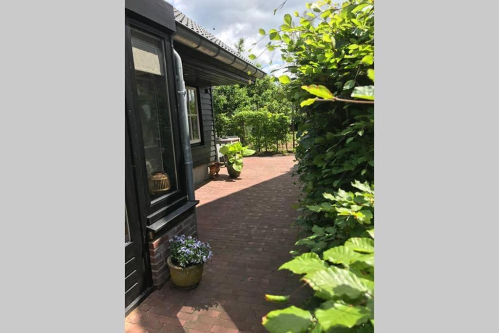 Uniek Houten Huis Nabij Bos En Plassen Hollandsche Rading Luaran gambar