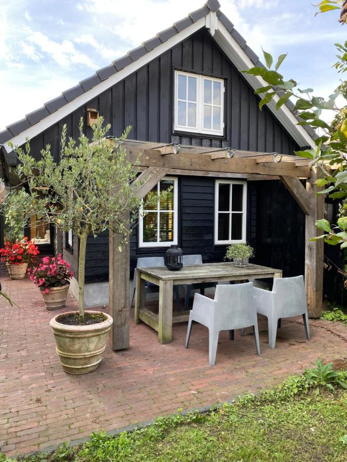 Uniek Houten Huis Nabij Bos En Plassen Hollandsche Rading Luaran gambar